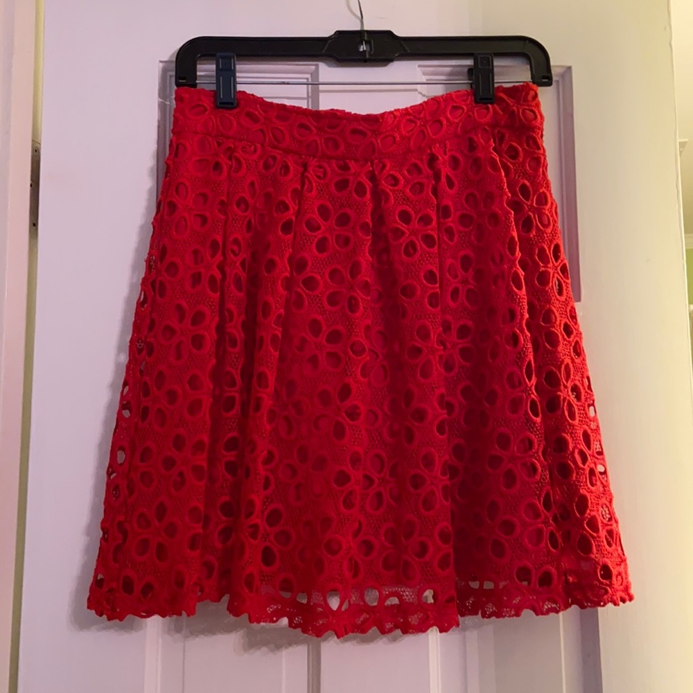 GB red skirt with floral overlay